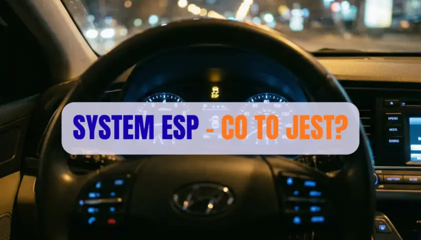 Widok z wnętrza samochodu nocą. Na desce rozdzielczej świeci się kontrolka ESP, a na ekranie napis "SYSTEM ESP - CO TO JEST?".